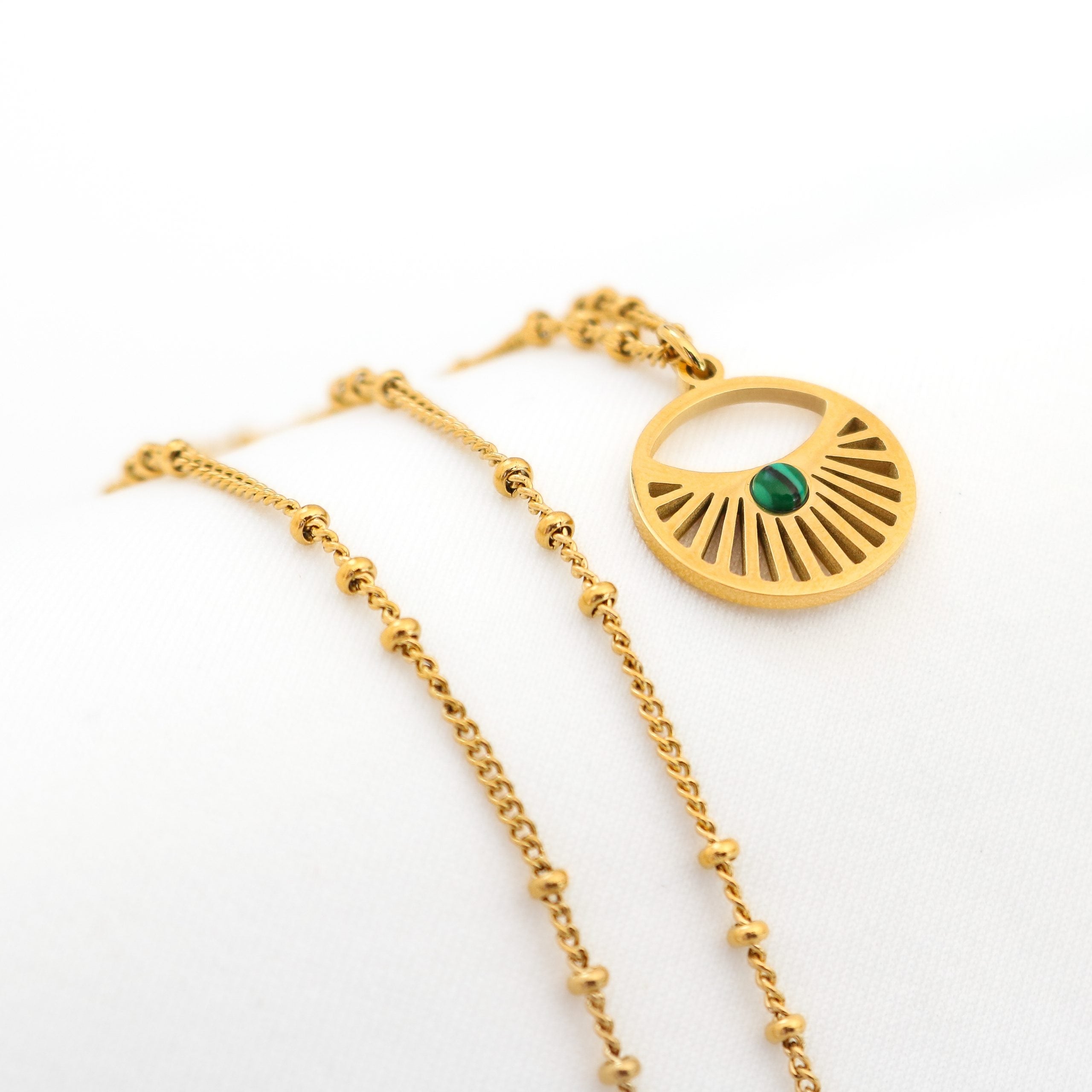 Daystar-Necklace-in-Gold-1_1aeb8b74-a11b-4bcb-bd9e-672a2cf81e76.jpg