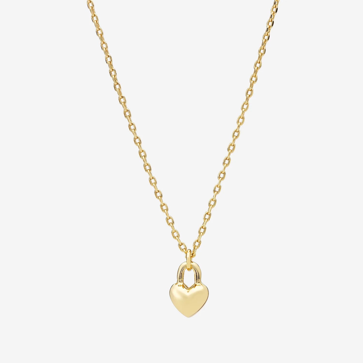 A delicate gold chain necklace with a small heart-shaped lock pendant against a white background.