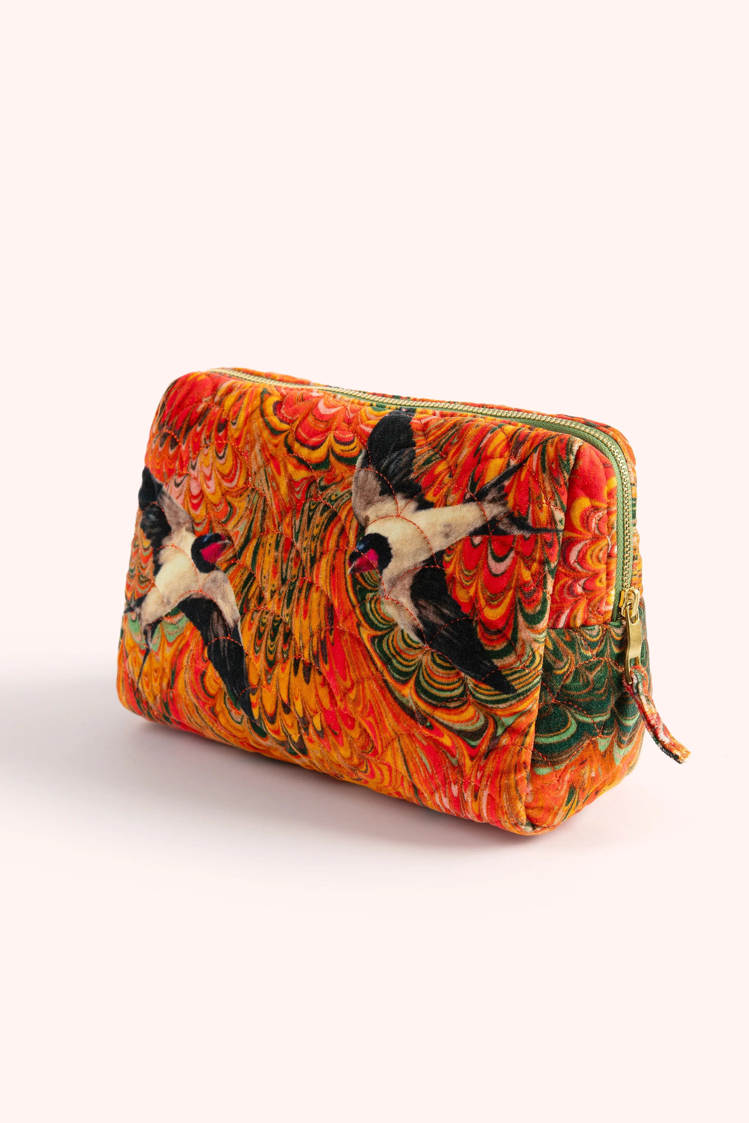 Powderquiltedwashbagswallowdesign.webp