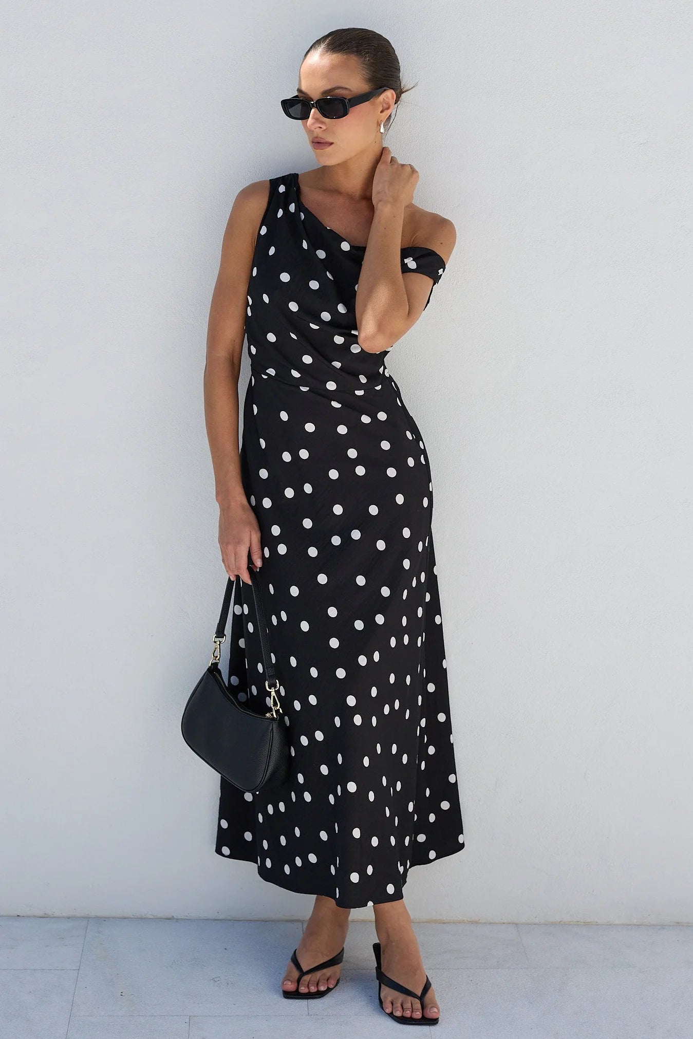 SpotlightBlackPolkaDotMidiDress_CP_3_1024x1024_2x_5b228d38-d58d-48da-abe6-4a7921399487.webp