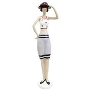 Vintage beach lady holding hat