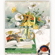Bespoke Letterpress 2026 Family Wall Calendar featuring hand-painted flower artwork by Dominika Keller, gold foil detail, and wire binding.