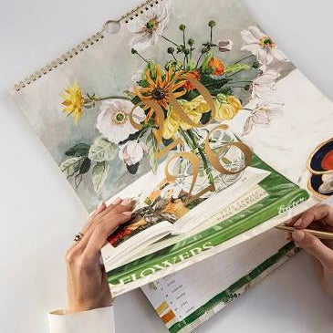 Bespoke Letterpress 2026 Family Wall Calendar with floral artwork, gold foil cover, and six-column layout for family planning.