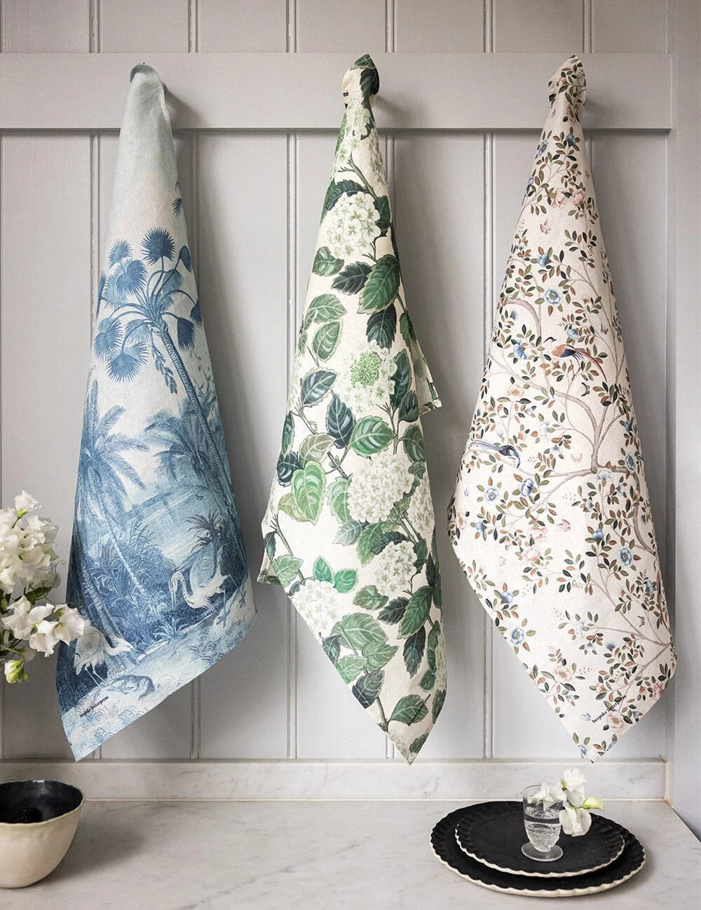 Bespoke Letterpress Camellia Tree Linen Tea Towel hanging with botanical print designs