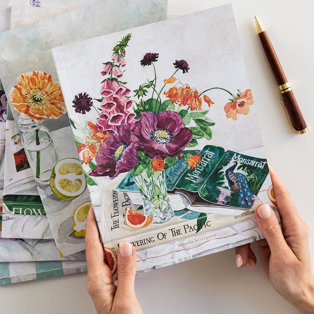Bespoke Letterpress Poppies & Foxglove Workbook with floral cover illustration held in hands