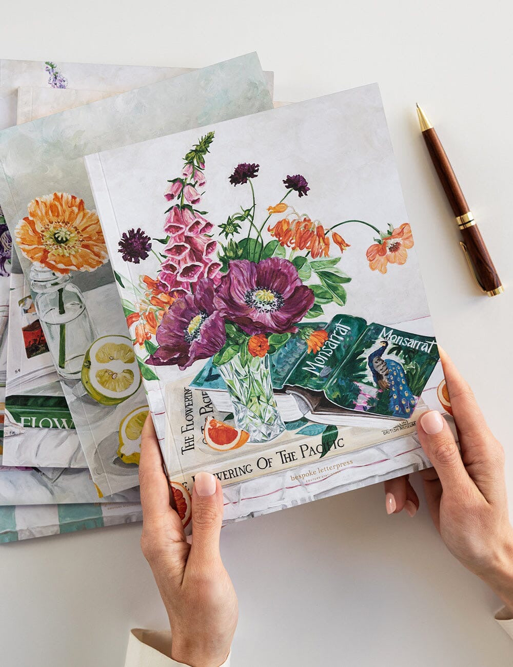 Bespoke Letterpress Poppies & Foxglove Workbook with floral cover illustration held in hands