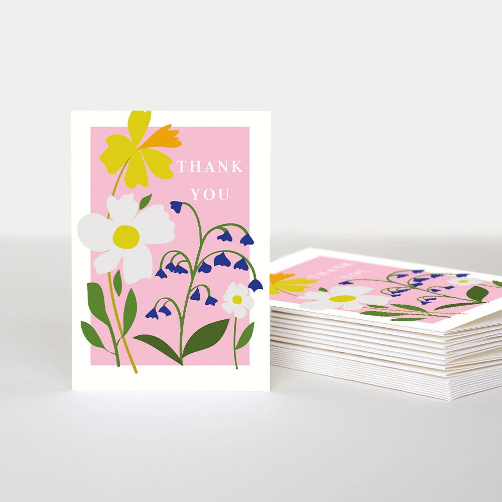 Caroline Gardner thank you notecards pack of 10 featuring bold floral illustrations on a pink background with the words “Thank You.”