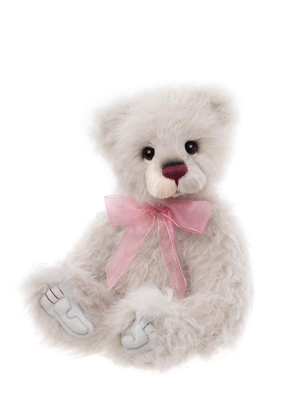 Charlie Bears Rosienna plush bear with soft white fur, burgundy nose, and a pink organza ribbon bow.