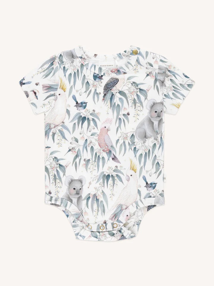 Baby bodysuit with Australian bush animals and birds pattern including koalas cockatoos galahs kookaburras and native flora