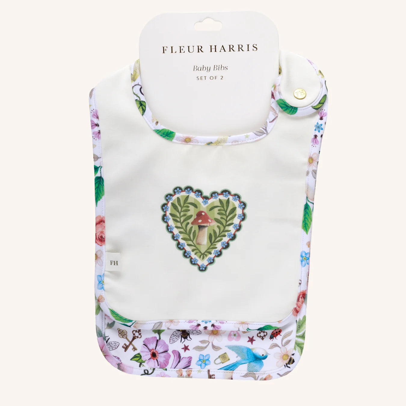 Fleur Harris Secret Diary Dandy Duo Bib set of 2 from the All My Hearts collection, featuring whimsical illustrations and gold snap closure.
