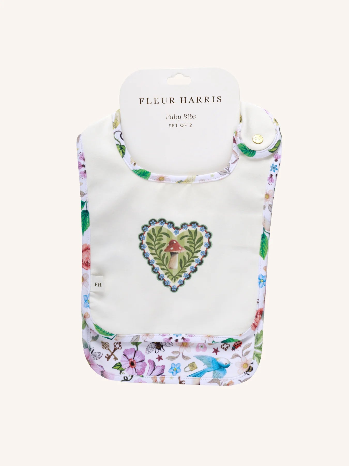 Fleur Harris Secret Diary Dandy Duo Bib set of 2 from the All My Hearts collection, featuring whimsical illustrations and gold snap closure.