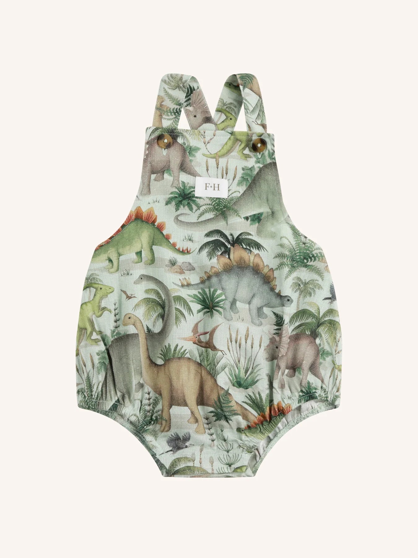 Fleur Harris Prehistorica Brontis Romper in Olive Leaf with all-over dinosaur print on soft linen fabric.