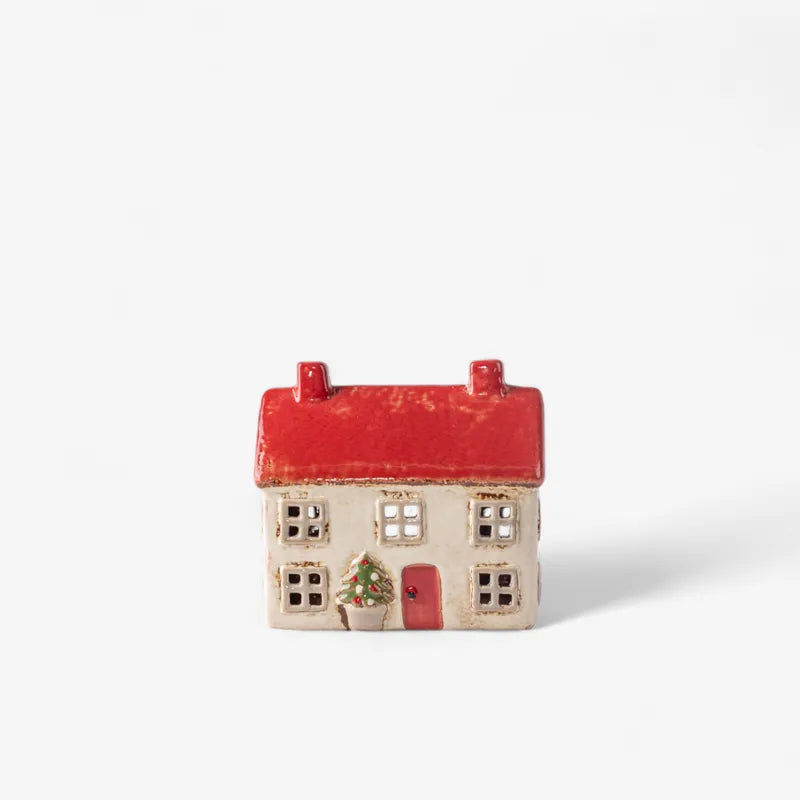 French Country Alsace Tea Light Cottage Christmas Stone ceramic house with red roof and festive tree detail, 13cm tall.