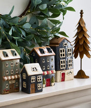 French Country Alsace Tea Light Shop navy ceramic house displayed with other tea light houses on mantel