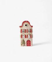 French Country Alsace Tea Light Villa Christmas ceramic house with red shutters, festive tree detail, and hand-painted finish, 19cm tall.
