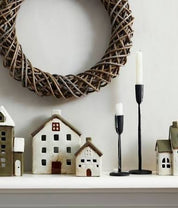French Country Alsace Tea Light Villa olive green ceramic house displayed on mantel with other houses and candles
