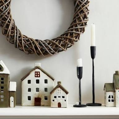 French Country Alsace Tea Light Villa olive green ceramic house displayed on mantel with other houses and candles