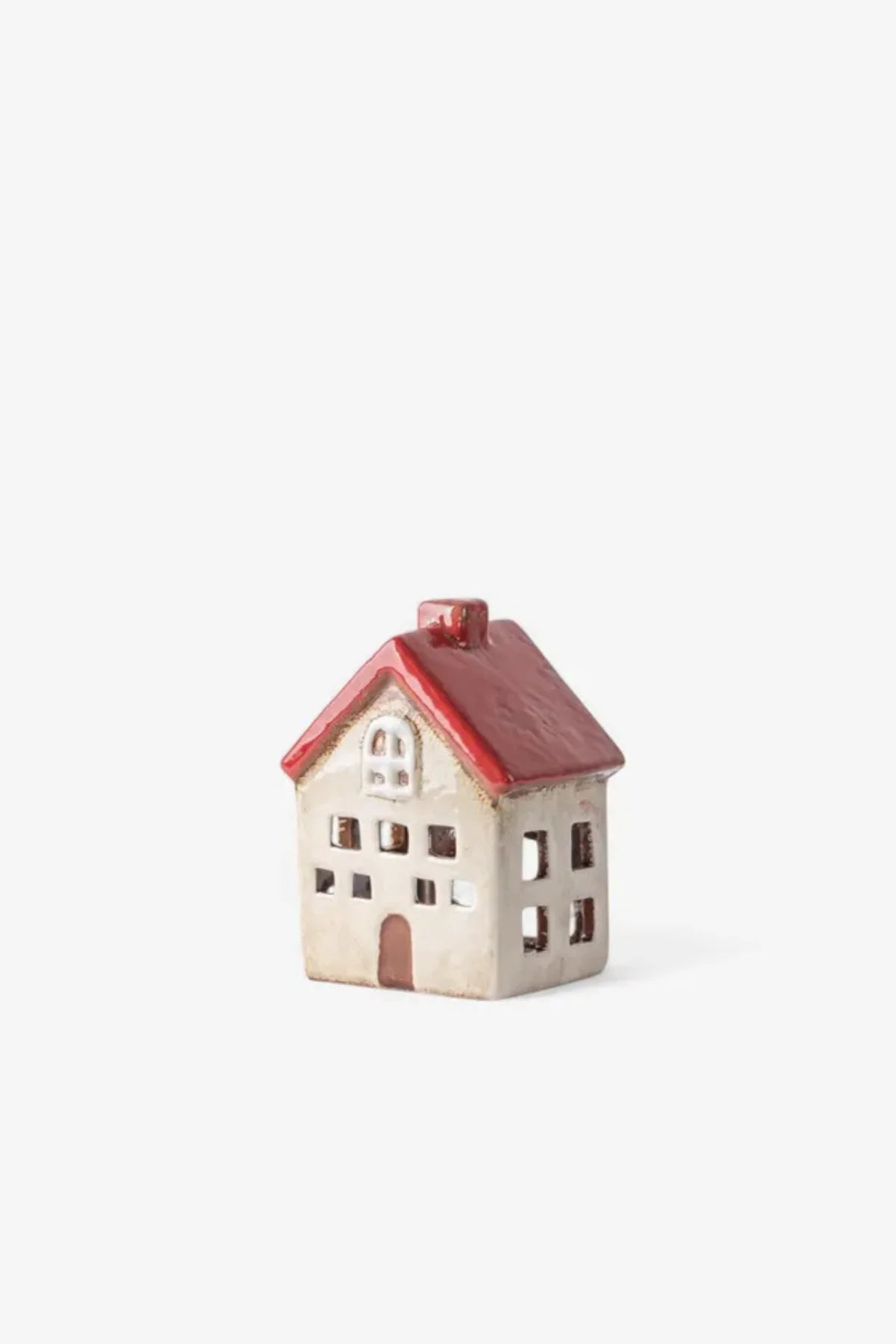 Small ceramic tea light house in white with red roof and brown door
