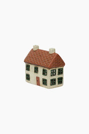 French Country Cotswolds Country Tea Light Cottage ceramic house with terracotta roof and green windows, angled view