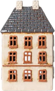 Front view of French Country Cotswolds Country Tea Light Estate House with cream walls, brown framed windows, and dark grey roof.