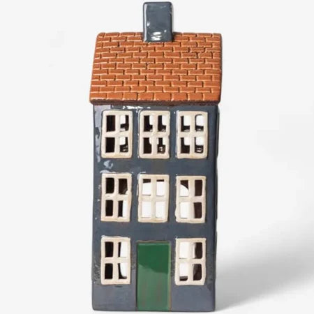 Front view of French Country Cotswolds Country Tea Light Grande Chalet with orange tiled roof and green door.