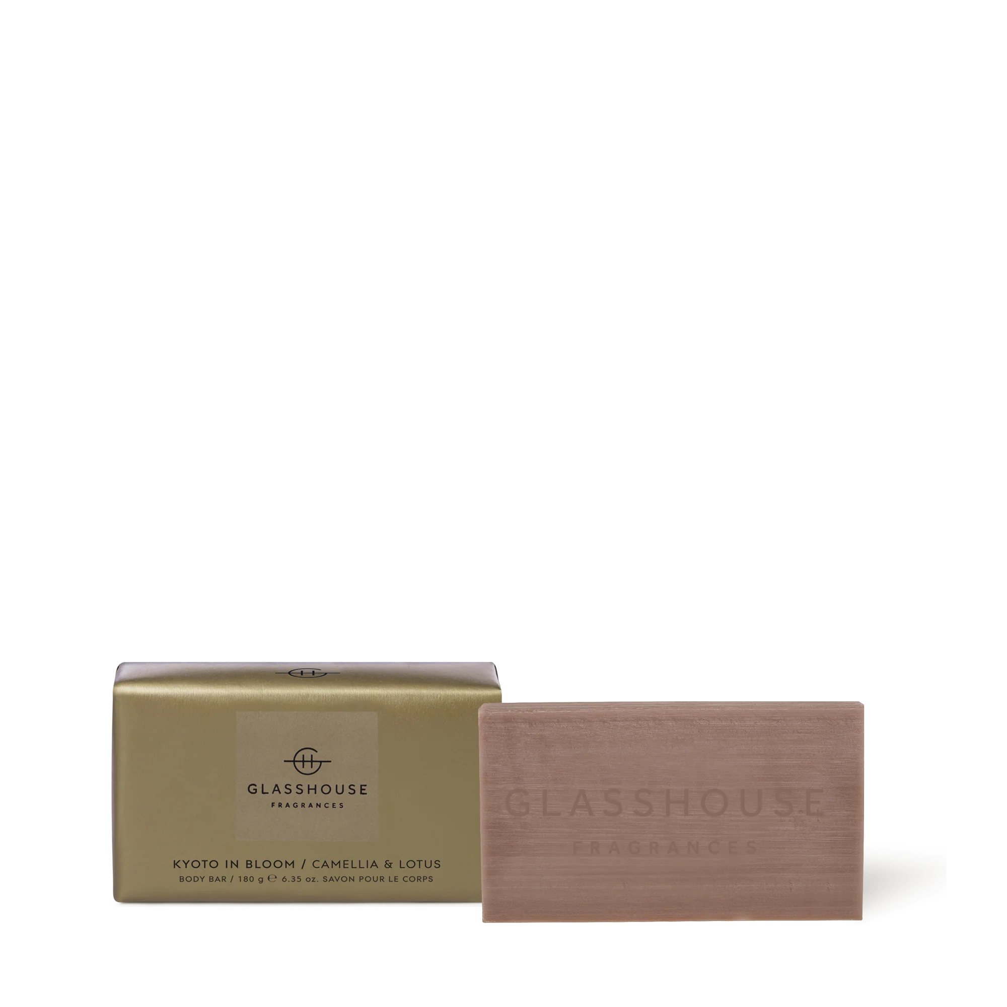 Glasshouse Kyoto In Bloom 180g Body Bar with Camellia & Lotus, showing the gold packaging and mauve-toned soap bar.