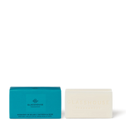 Glasshouse Fragrances Midnight in Milan 180g Body Bar with saffron and rose, shown in teal packaging beside the embossed soap bar.