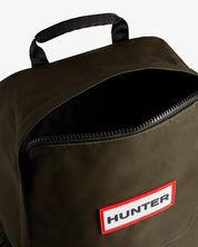 Top view of Hunter Nylon Large Backpack in Dark Olive with zipper detail