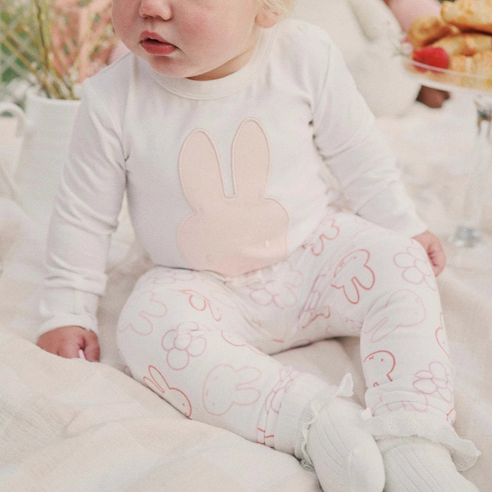 Kynd Baby Miffy Frill Legging Pink styled on baby organic cotton leggings with bunny and flower print soft elastic waistband full length cozy playtime outfit