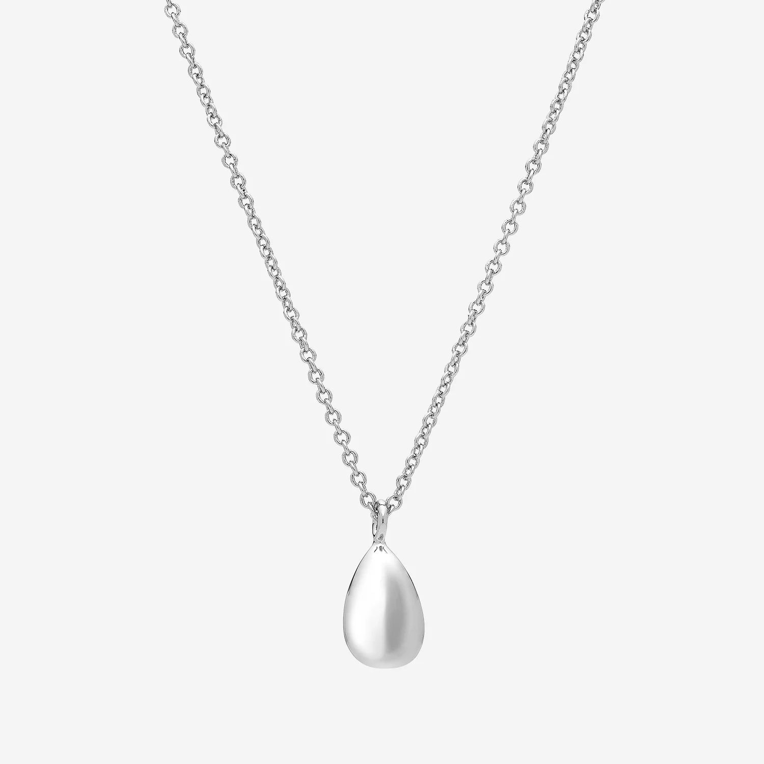 LIBERTE Shelby Necklace in silver, minimalist teardrop pendant on fine chain, product close-up