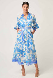 Front studio view of ONCE WAS Carmen Silk Cotton Maxi Dress in Azure Mosaic with tie belt and blue floral print.