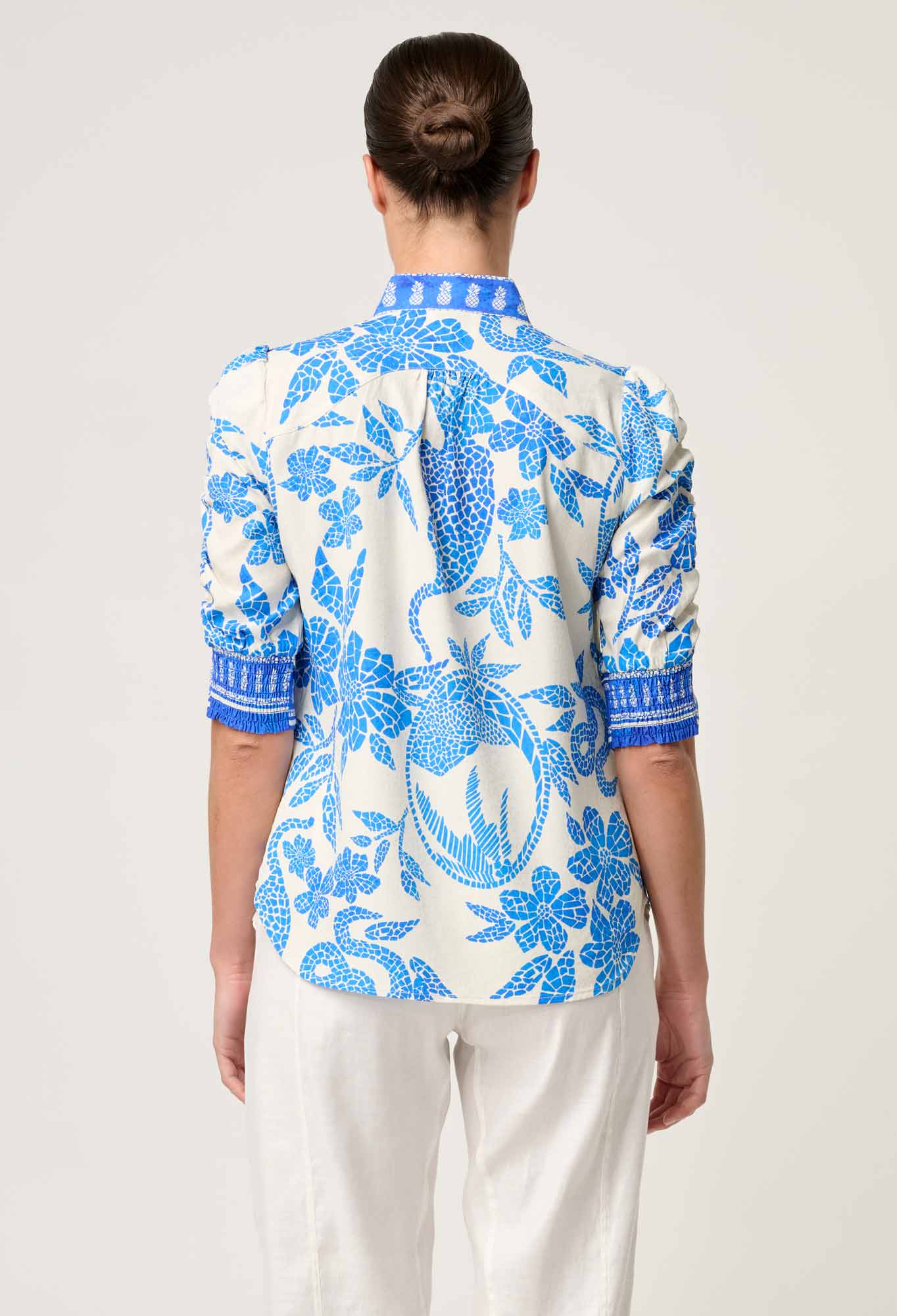 Model wearing ONCE WAS Calantha viscose dobby rouched sleeve shirt in azure mosaic back view