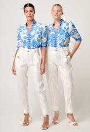 Two models wearing ONCE WAS Calantha viscose dobby rouched sleeve shirt in azure mosaic