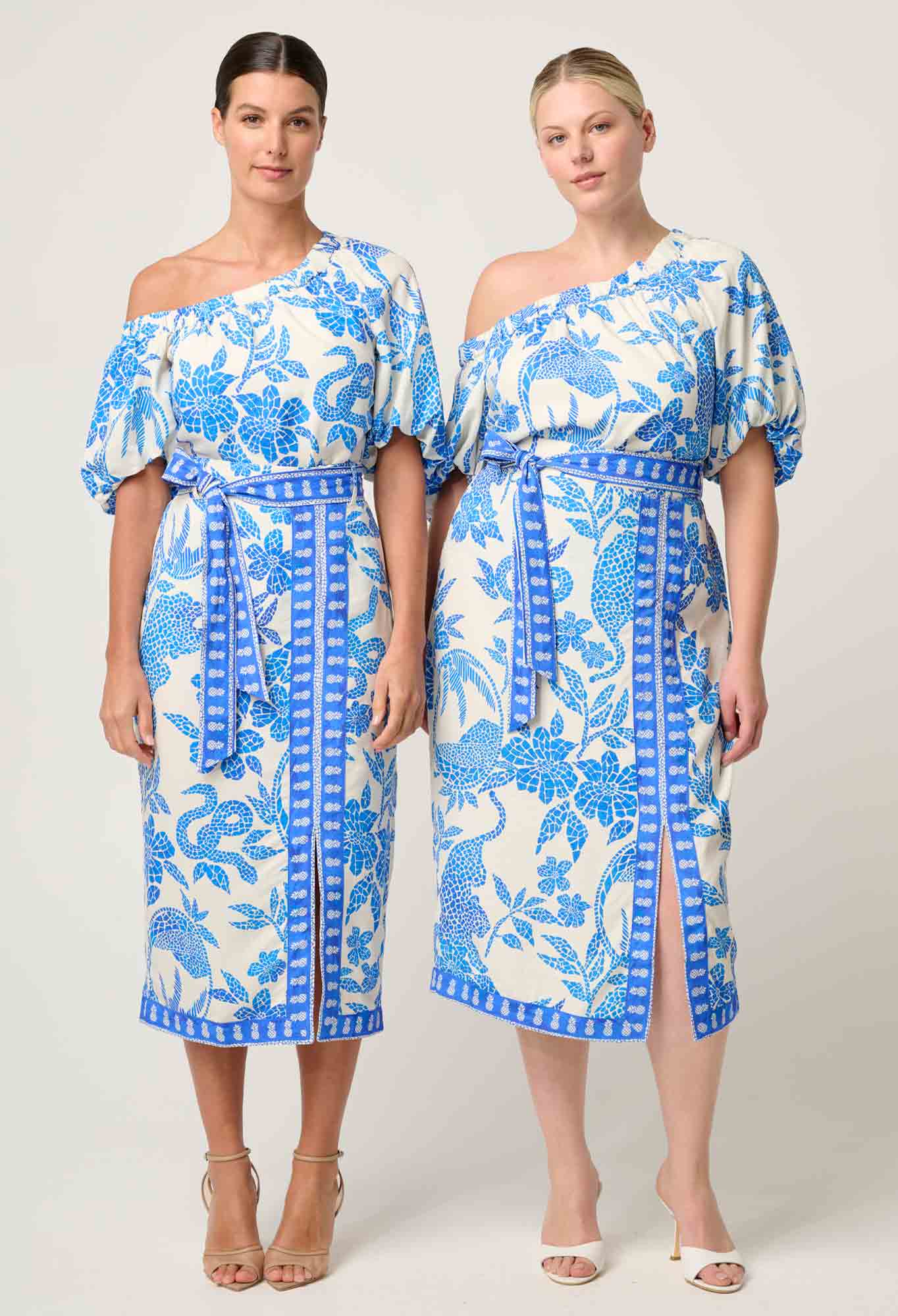 Two models wearing ONCE WAS Carmen silk cotton maxi dress in azure mosaic