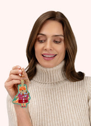 Model holding POWDER beaded fall fox keyring