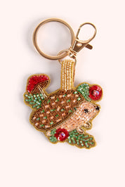 POWDER beaded hedgehog keyring with gold ring and clasp.