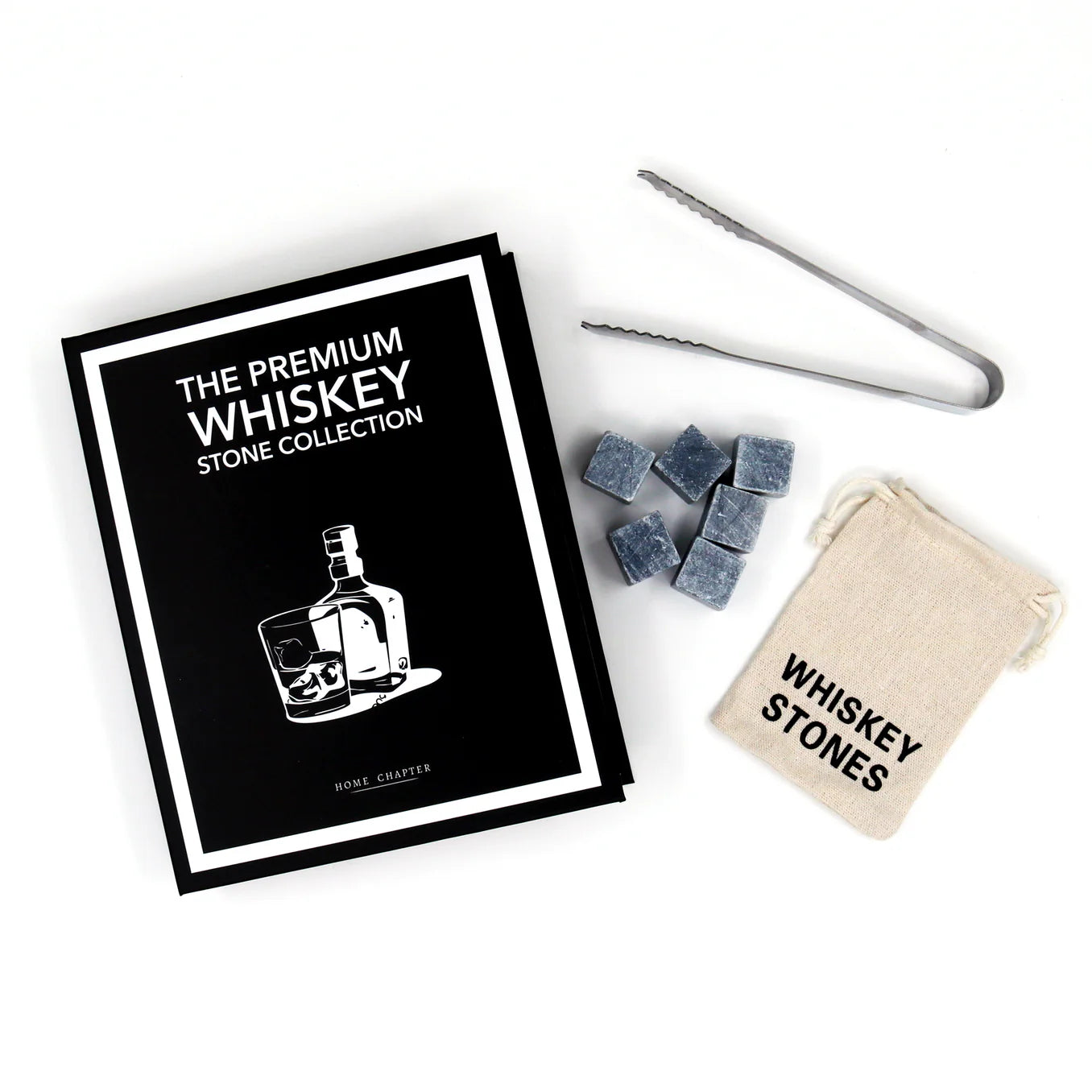 The Premium Whiskey Stone Collection set displayed with pouch, tongs, and whiskey stones
